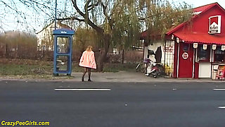 Nylon woman peeing on street