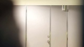 Skinny white chick in black pants filmed in the toilet room