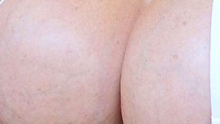 Busty curly brunette with big boobs fucks on couch