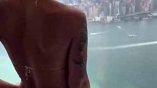 Monika Fox In Purple Bikini Swims In Pool & Poses By Window