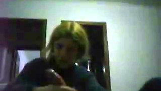 young blonde gives a handjob on friend until he cums