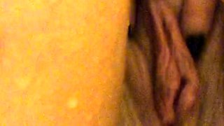 Big boobed Memphis masturbates in a bodystocking