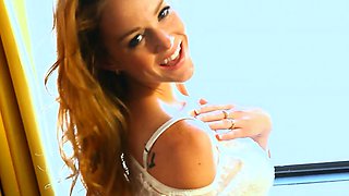 Petite redhead teen Cora posing naked