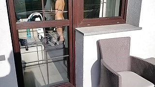 a stranger looks at a naked woman from the balcony in a hotel, she is masturbating, she comes out to him and helps him