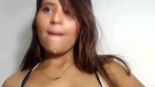 Milky tits babe sucks a load of milk from her tits and spits it all over her body