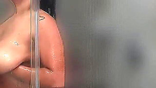 Brunette Big Tits Touches in the Bathroom After Gym