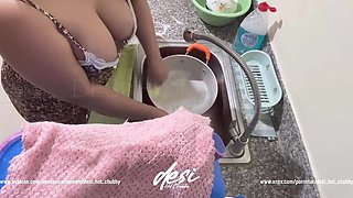 Indian Desi Bhabhi Was Working in the Kitchen Washing Dishes and Showing Her Big Boobs