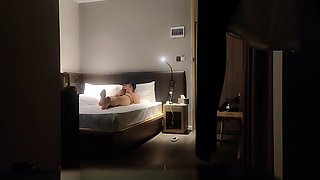 Cute amateur asian web cam girl playing with her toy