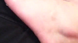 Worshiping the feet of a tattooed gothic lady