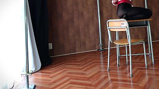 A Woman Is Being Punished While Wearing A Vibrator-equipped Chastity Belt