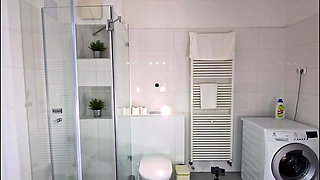 Petite brunette babe in light hot mini skirt gets bored and ignored in the bathroom