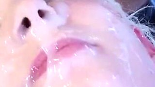 Blonde babe gets her face covered by cum