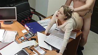 Hot office secretary sucks and rides her boss on the desk