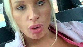Blonde is flashing her big boobs in the outdoors