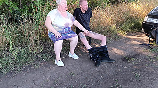 A neighbor sucks my dick in a public park on a bench until I cum