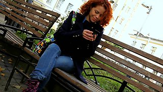 Redheaded Masha in a mini skirt teases with her perky naturals and hairy pussy