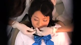Dazzling Asian teen gets used by horny doctors on hidden cam
