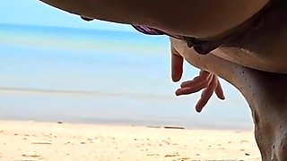 Sexy Hairy MILF Shows Pussy and Asshole and Pisses on Public Beach