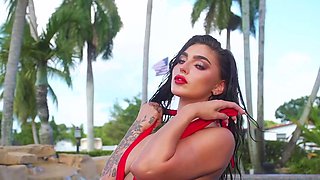 Big ass stunning beauty strips in a pool