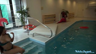 Risky public pool sex with a hot brunette babe and big-dicked dude