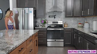 Mature stepmom fucks stepson in kitchen