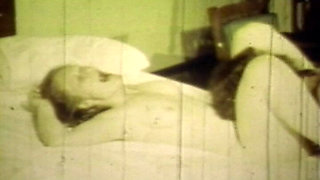 Worn Sepia Loop Captures Curly Retro Couple in Raw Bedroom Passion