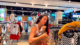 Busty Brunette Flashes in Store