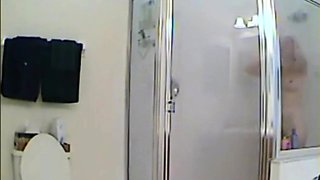 MILF stepmother spied in the shower