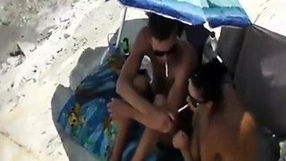 Peeking at stepdaughter and BF on beach