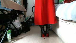 Red midi skirt and pointed Italian thigh high boots