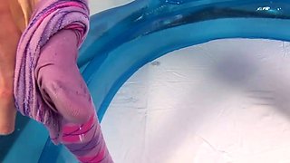 Naughty lesbian wet inside the piss pool