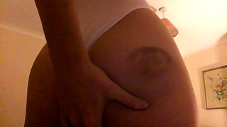 Mature milf plays with a blue toy