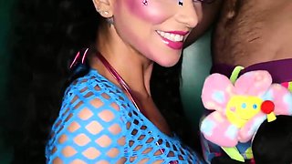 Brunette dame in blue mesh gives a blowjob