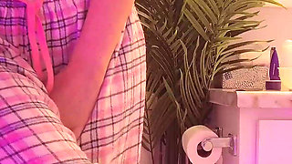 Emily pissing in the bathroom