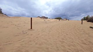 Lustful and busty girl traveler meets a guy at a desert and gives him outstanding handjob and titjob