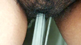 Hot aunty pissing in bathroom and mastrubating hardly