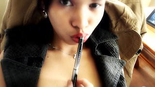 High heeled asian secretary teasing in the office