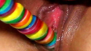 Tattooed asian punk lesbians drilling each other's holes with a candy