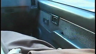 Commuter redhead carpools with creep who debases her in car in city traffic