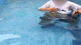 A Hot Couple's Risky Fun in the Swimming Pool.