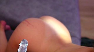 Cute amateur teen girl toying her pussy in bed on cam