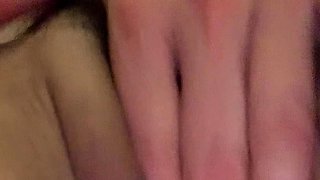 Brunette with glasses masturbates hairy pussy