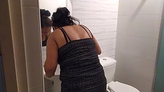 Licking her pussy in the bathroom