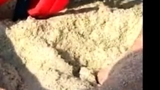 Big-Breasted Girl's Orgasm at the Beach
