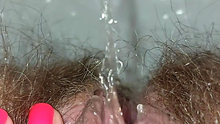 Pissing Woman in the Toilet
