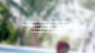 Woman Hijab Bathing Naked in an Open-air Hotel Pool
