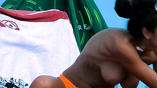 Nudist teen is filmed outdoors