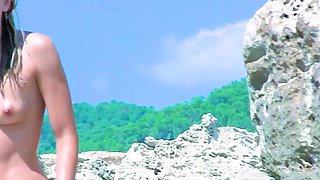 Energetic young nudist chicks secretly filmed having fun
